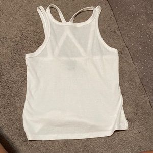 Rue 21 White tank, cross back.